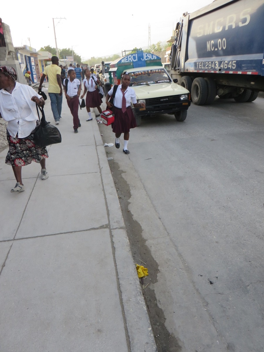 truck painted with the words, "Merci, Jesus"