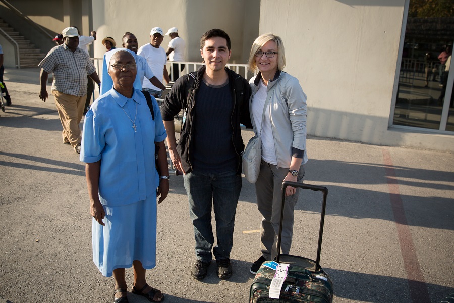 nun, non-profit employee and volunteer photographer posing for photograph