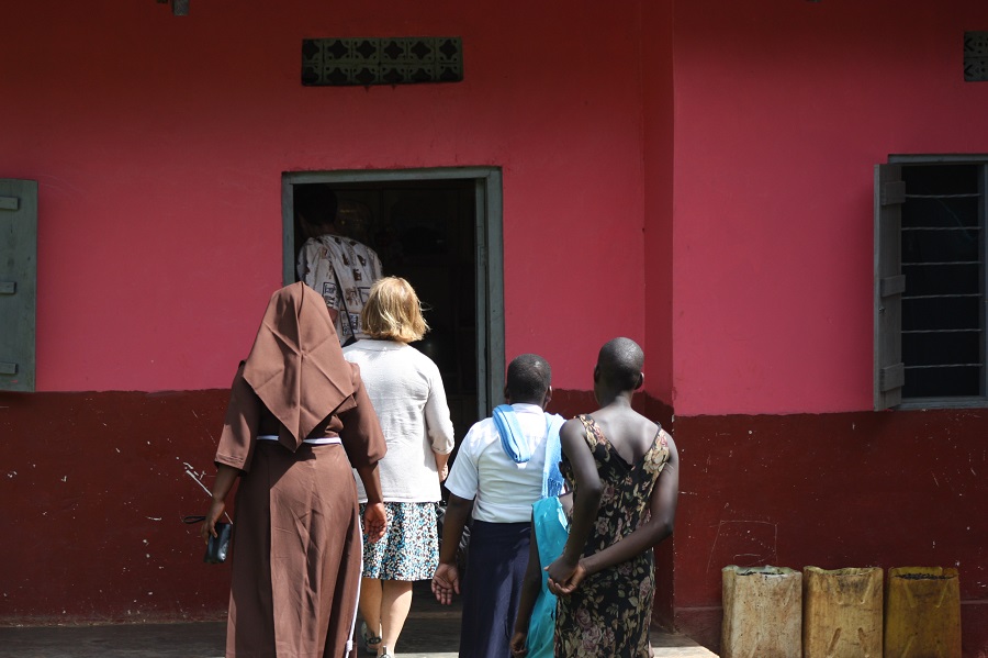 The families go inside the house for tea