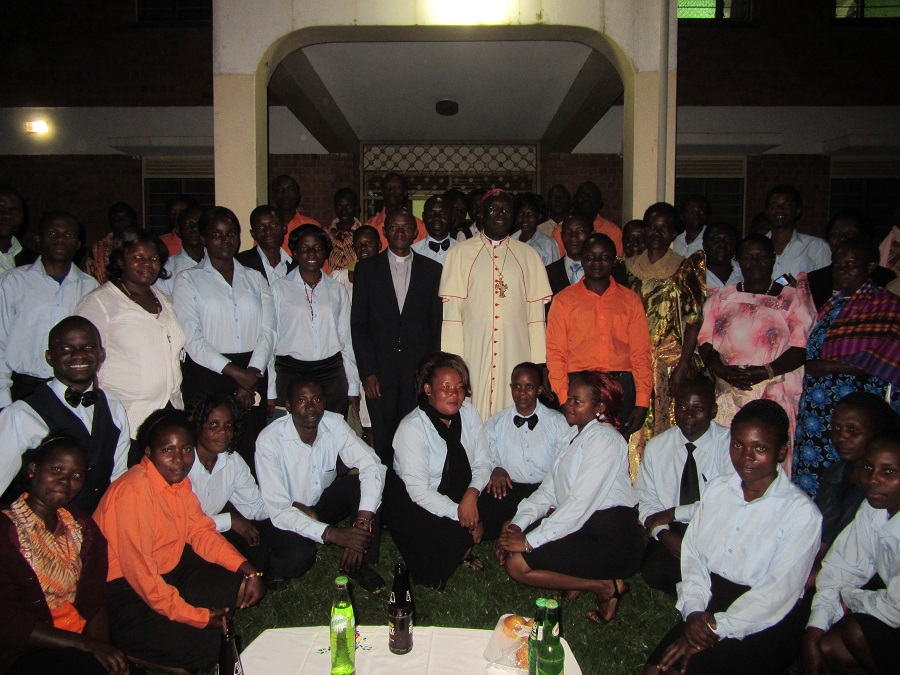 It was a bit dark, but we did manage to get a group photo at the end. Fr. JohnBosco is standing next to Bishop Kakooza. 