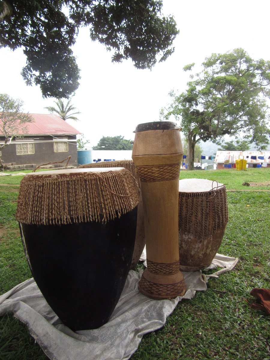 The drums come in all shapes and sizes, but are made of the same main materials - wood and cowhide. The wood is hollowed out and covered with cowhide on both ends. Strings, also made of cowhide, hold the top and bottom surfaces together.