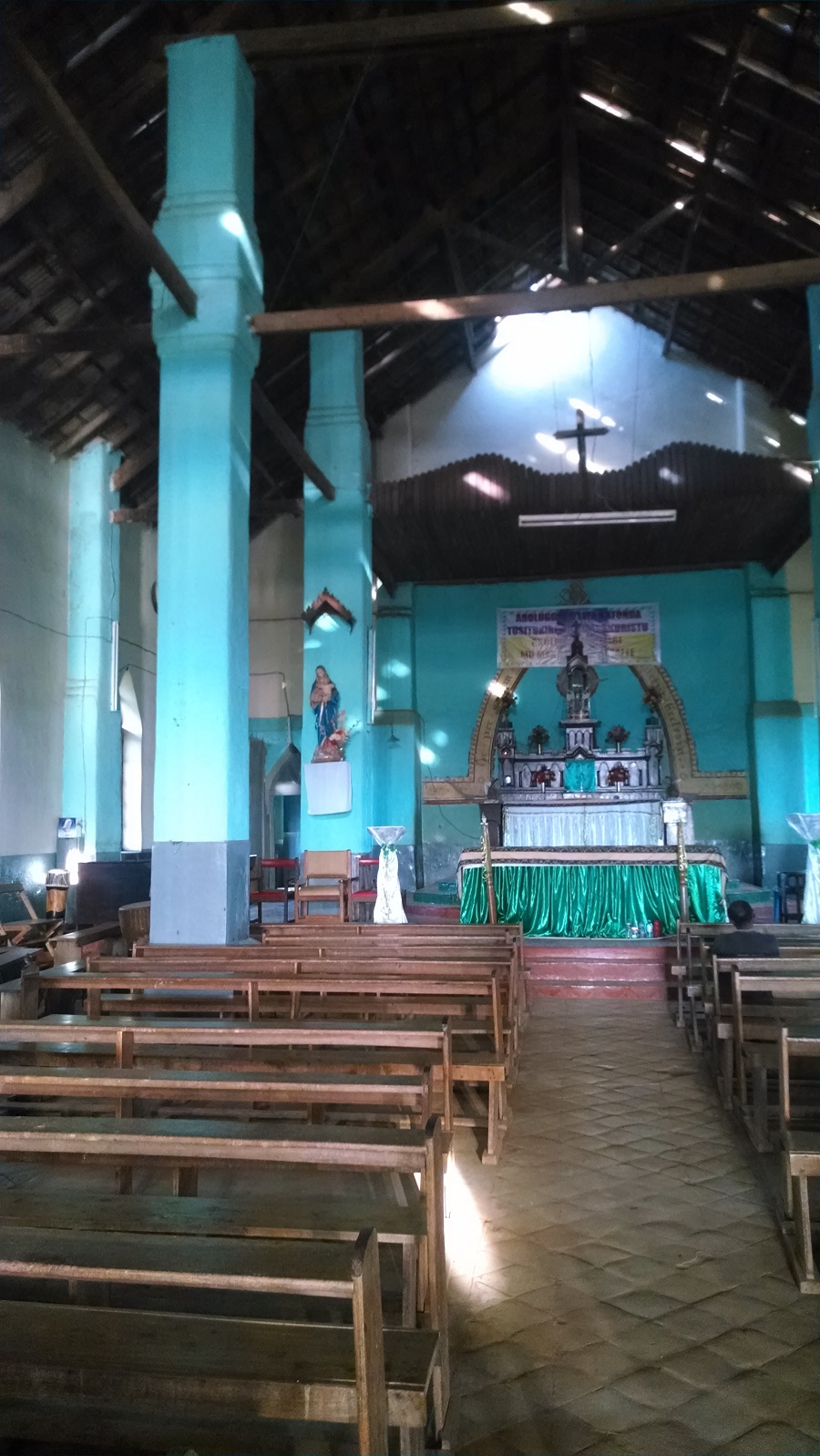 Light pours into the sanctuary from the holes in the roof.