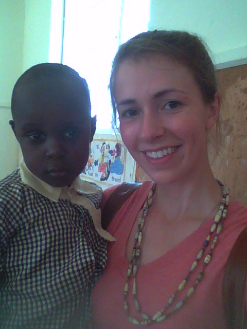 Catherine with Verone, the boy whom her parents sponsor through CARITAS For Children. 