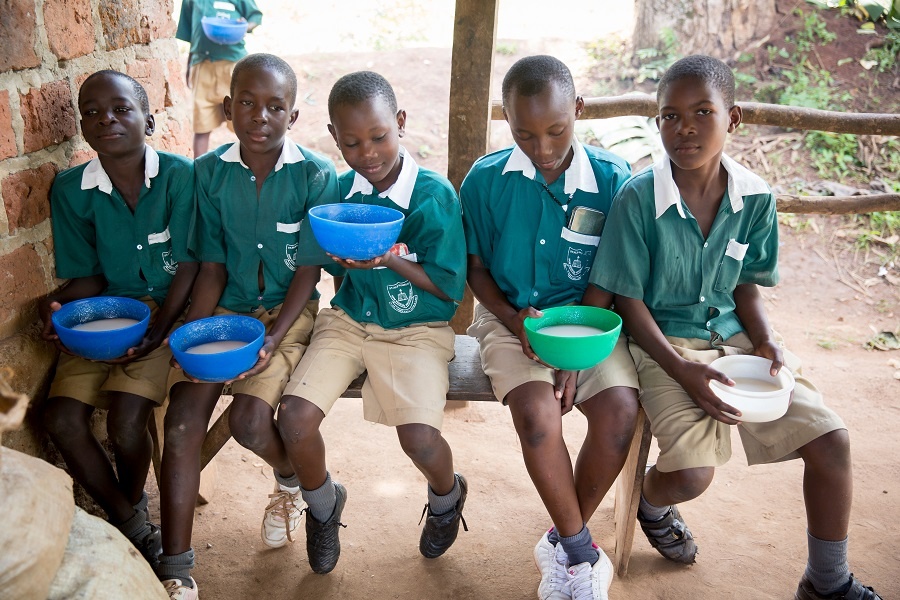boys with porridge meal.jpg