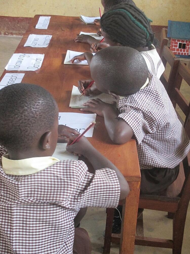 Children_learning_to_read_and_write