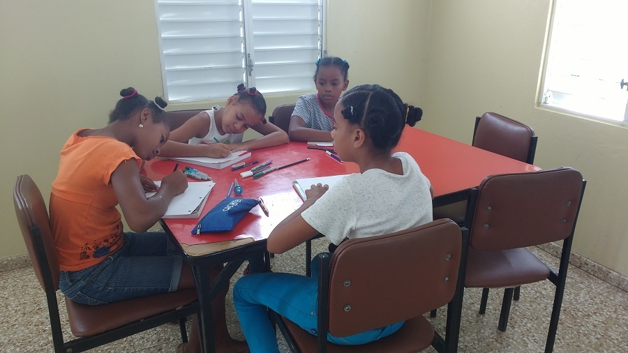 girls writing letters to sponsors.jpg