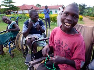 Ugandan with Rosary beads-2.jpg