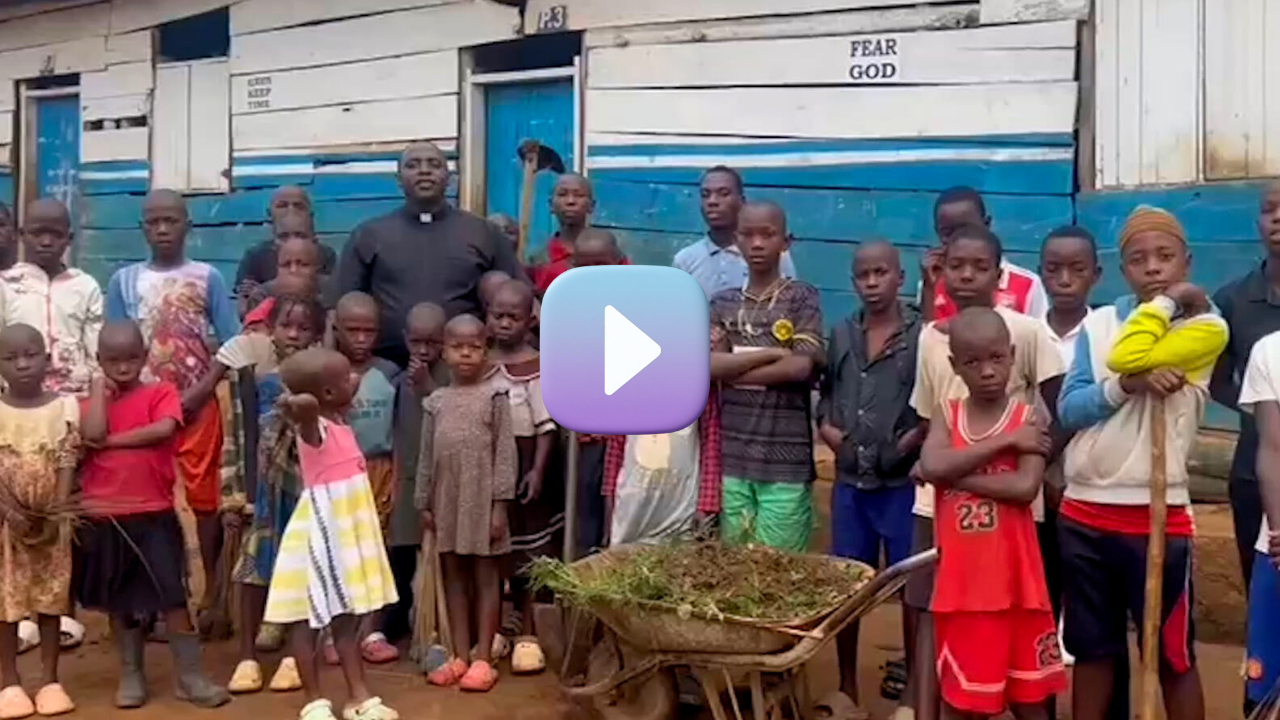 Fr. Frank with Children at School 1 Fr. Frank with Children